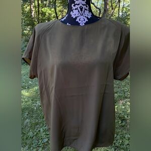 Olive green blouse with shoulder padding. Size L
